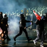 Turkish anti-riot police officers use pepper spray