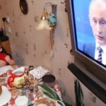 Путин по телевизору