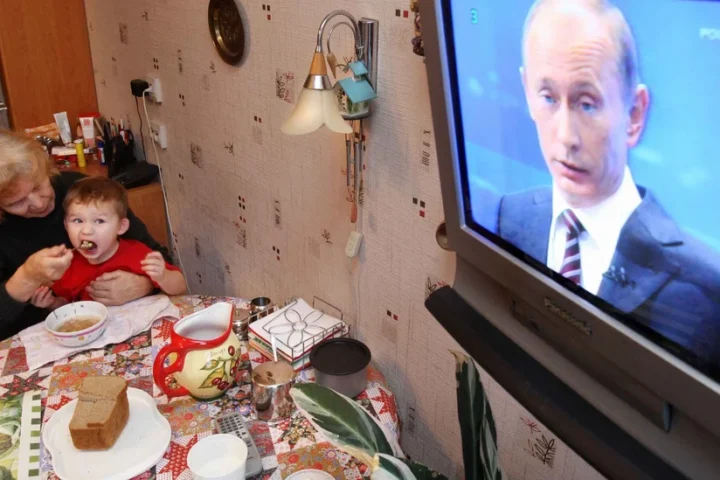 Путин по телевизору