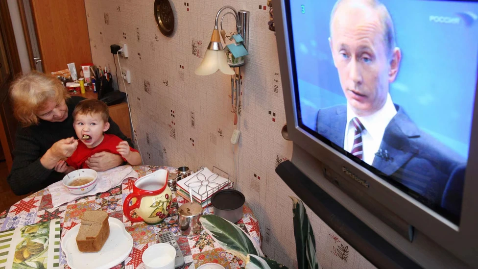 Путин по телевизору