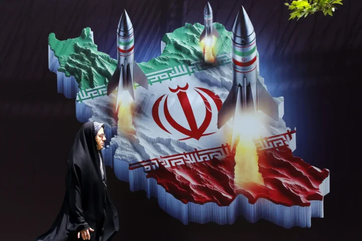 A banner depicting Iranian missiles in Tehran