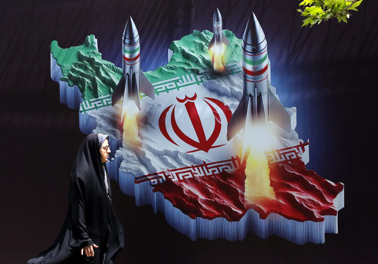 A banner depicting Iranian missiles in Tehran