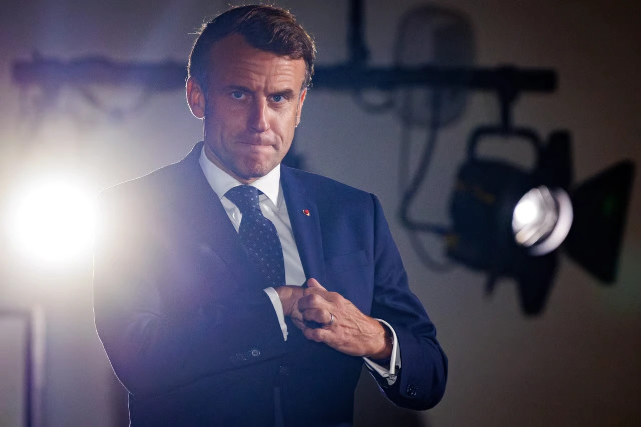 Macron is looking for something.