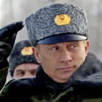 Russian President Vladimir Putin watches